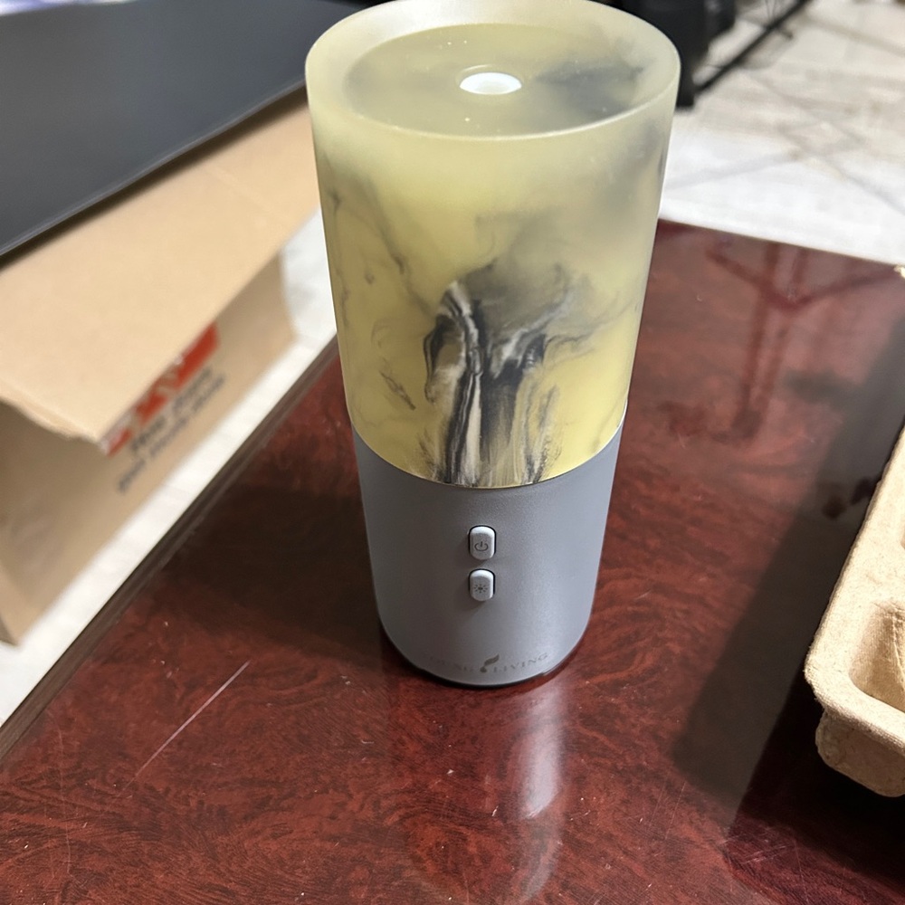 Young Living Silver Diffuser Brand New in original box with packing.